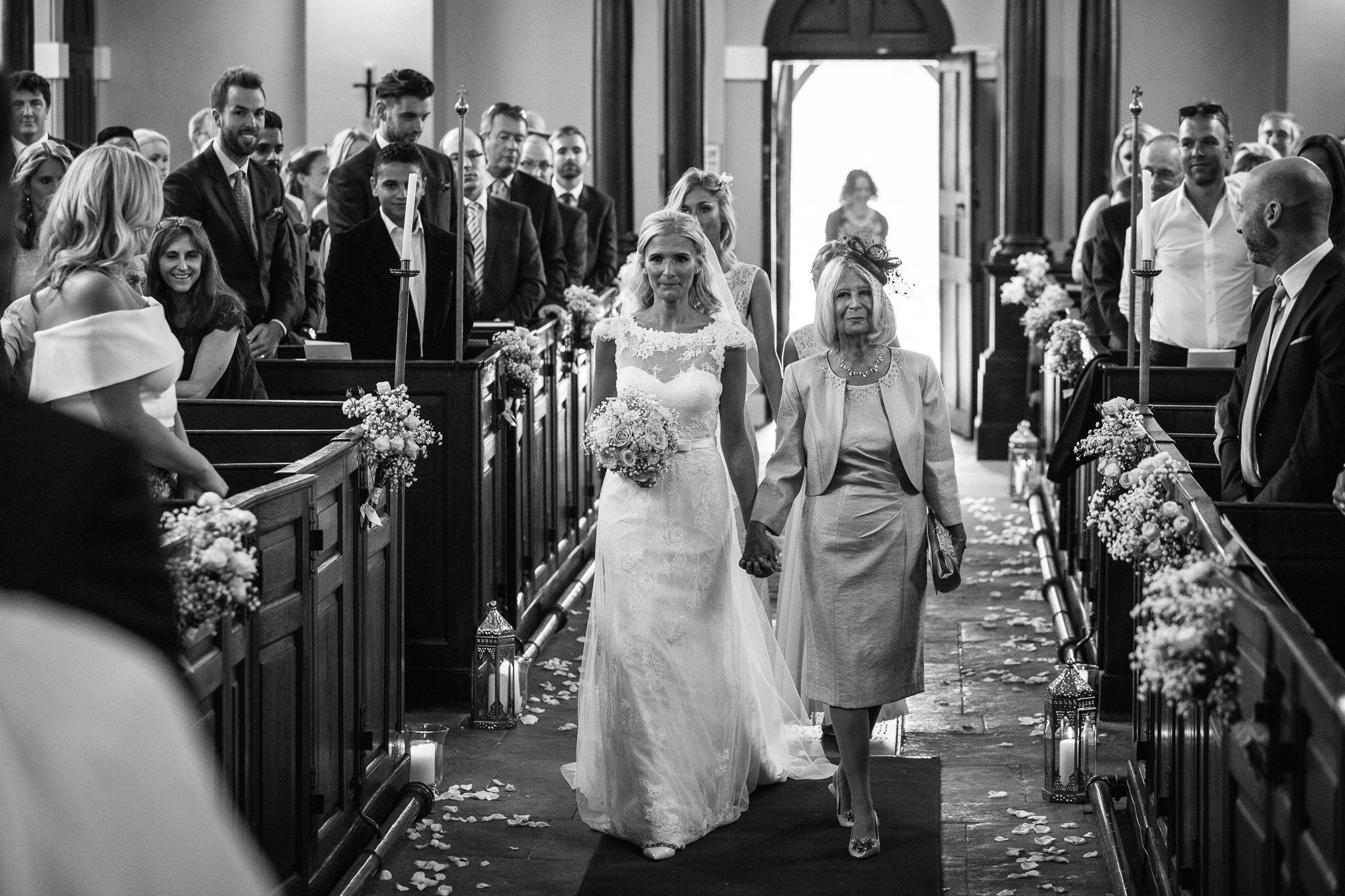  Bride walks down the aisle at St Michael's Church Aynho, Banbury OX17 3BQ 