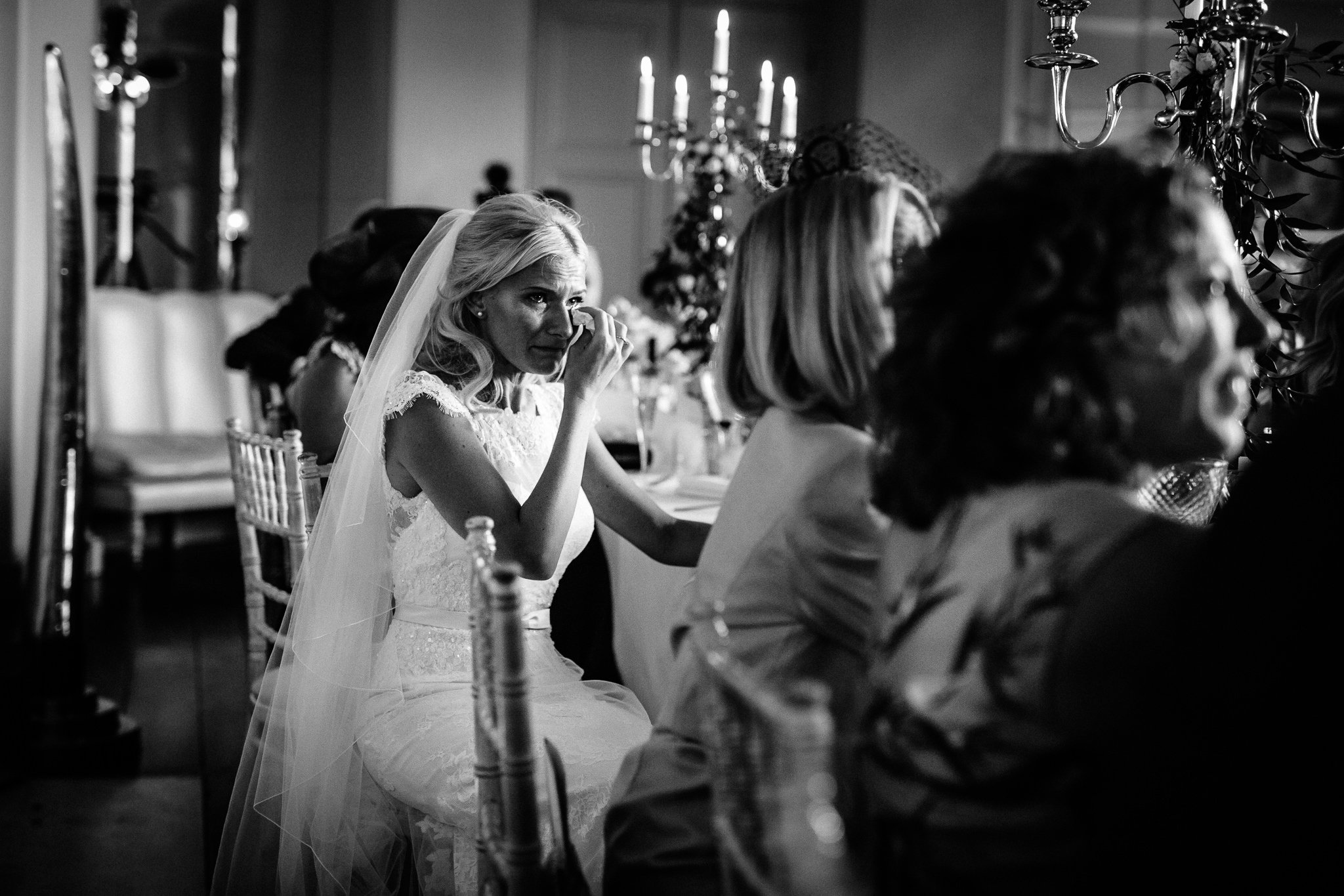  Bride wipes away a tear at Aynhoe Park 