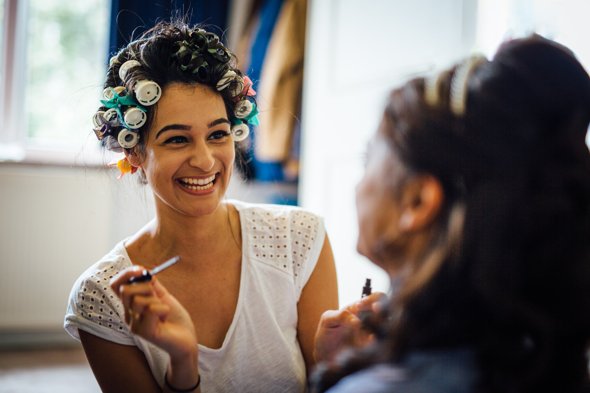  Bridesmaid with curlers in her hair 