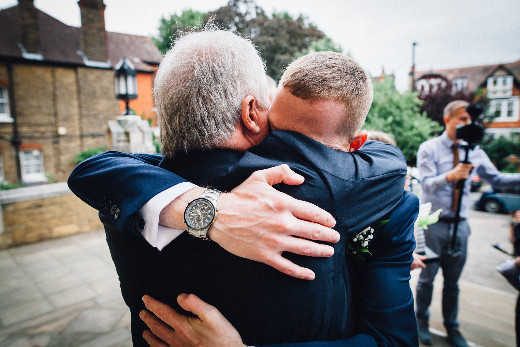  Groom hugs his Dad 