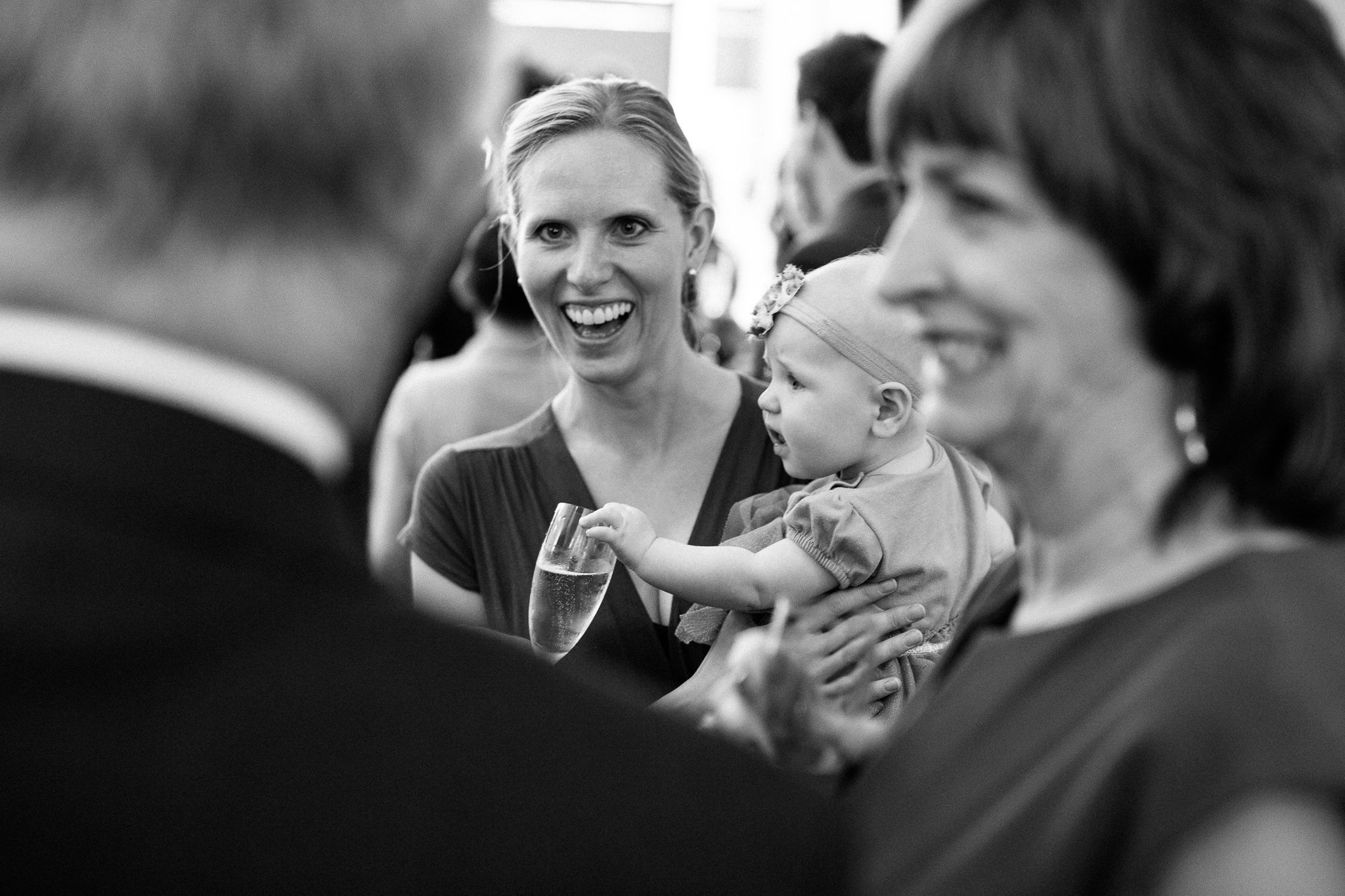  Wedding guest holding a baby 