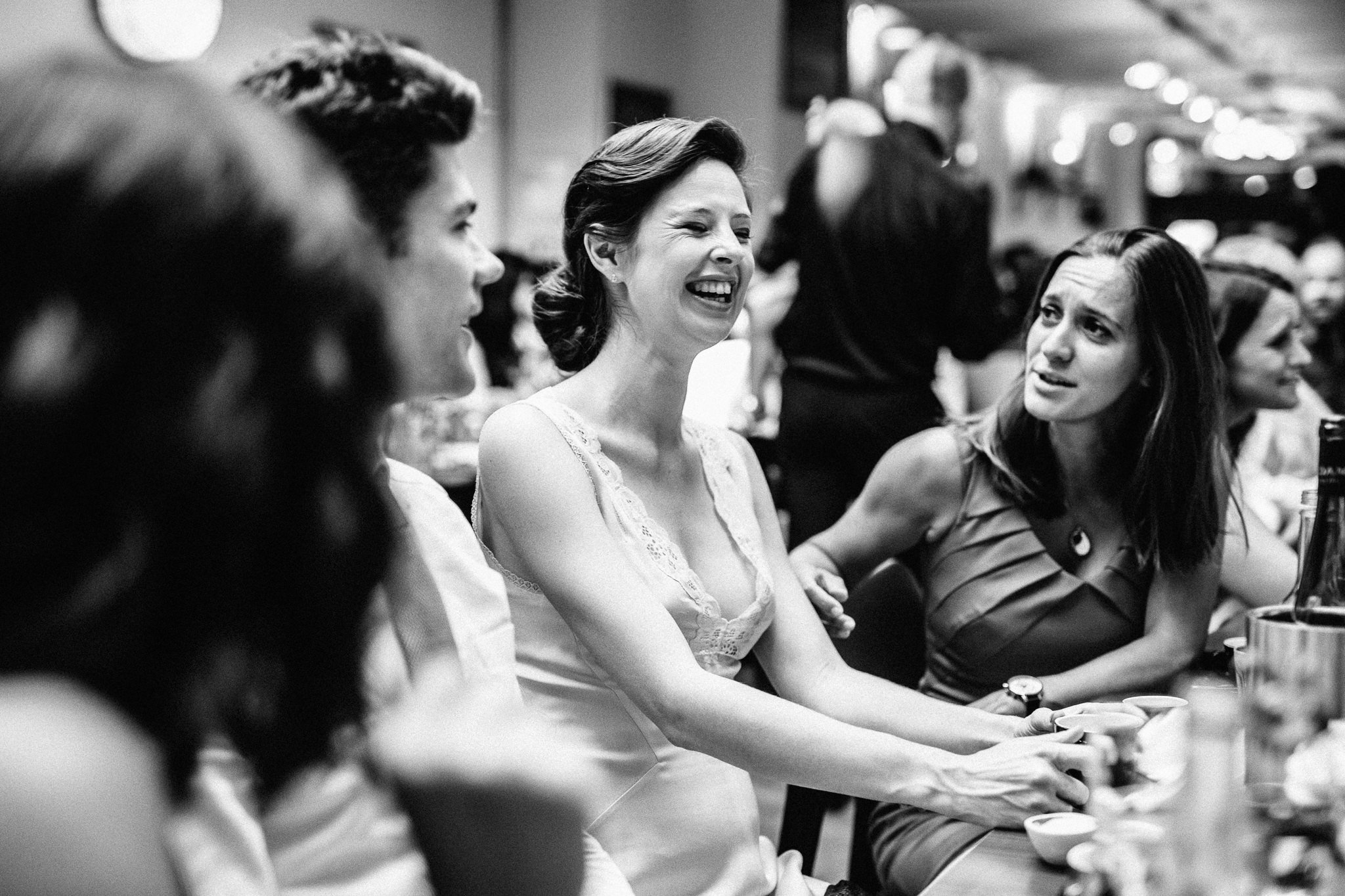  Bride laughing with her friends 