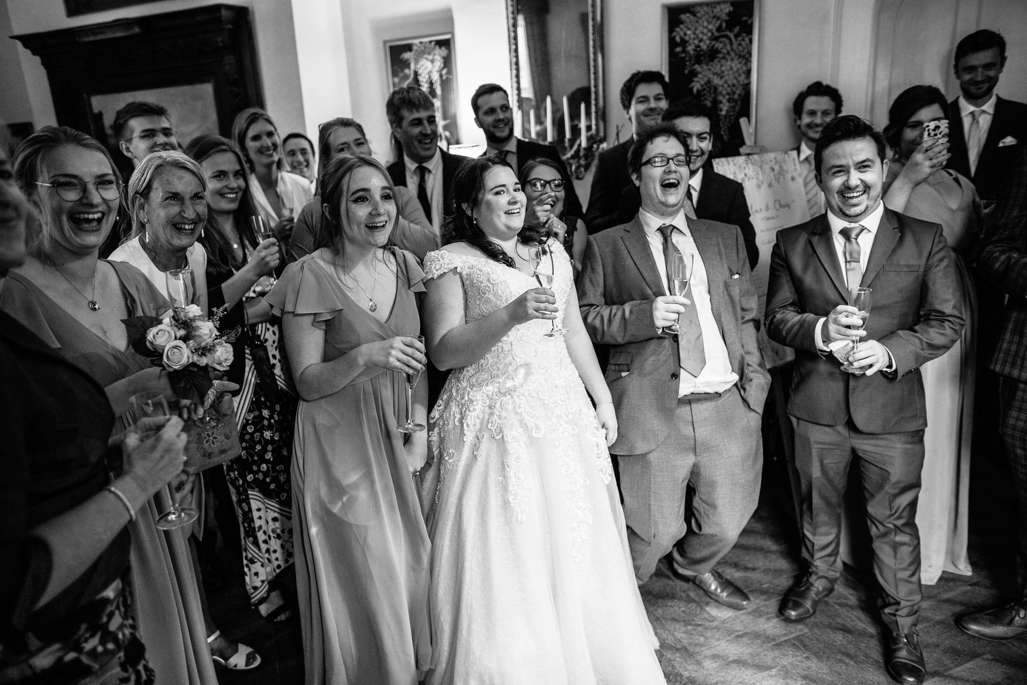  Bride and Guests reacting to the speeches at Wadhurst Castle 