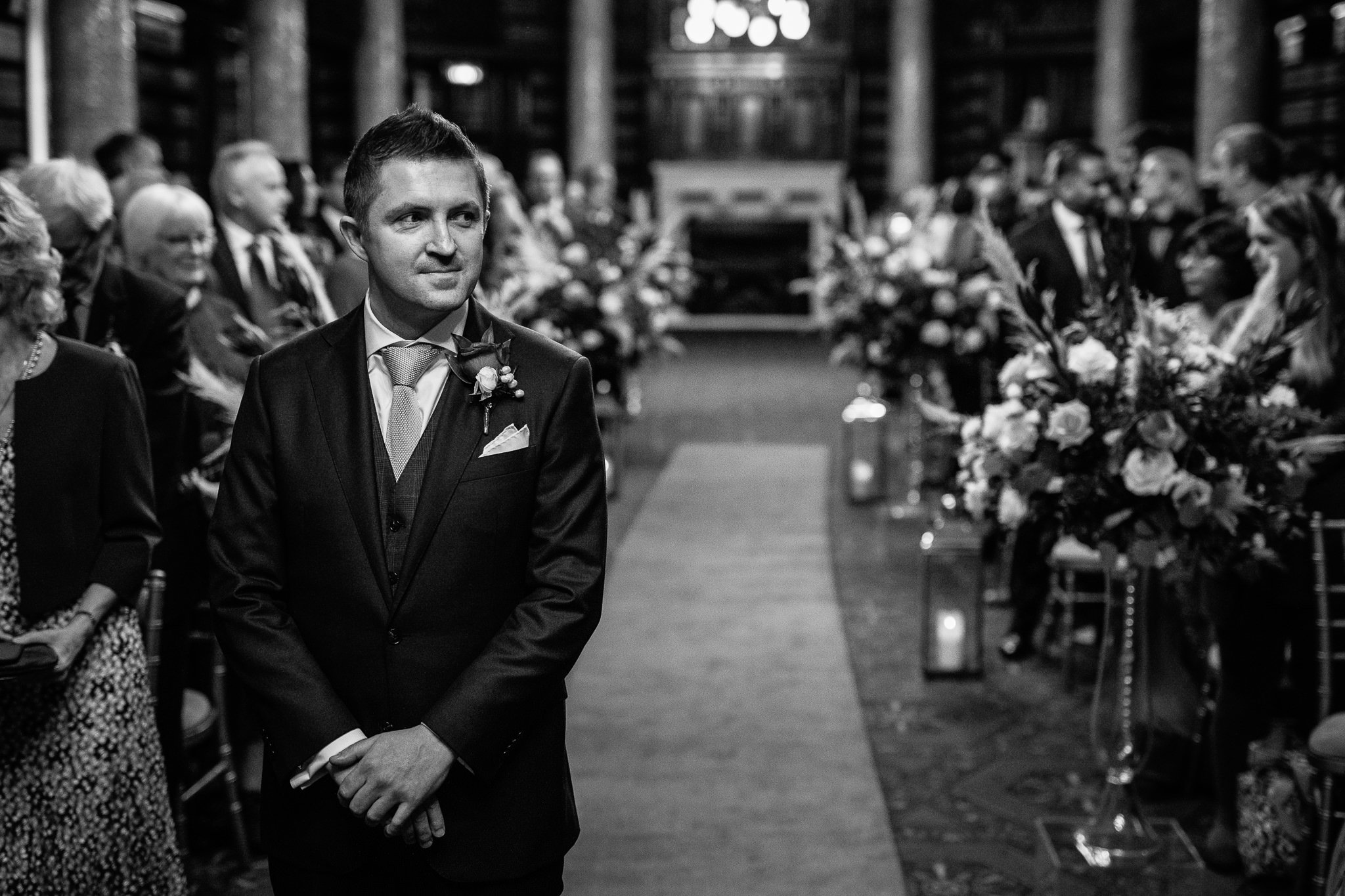  Groom waits for the Bride during the wedding ceremony at One Whitehall Place 