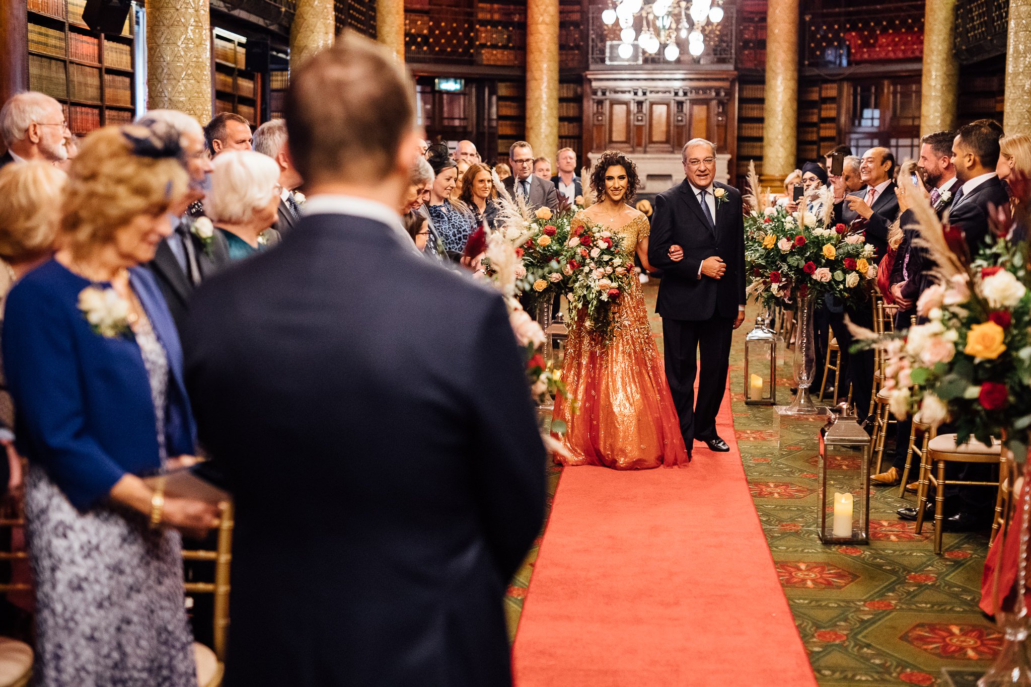  Bride walking down the aisle at One Whitehall Place London 