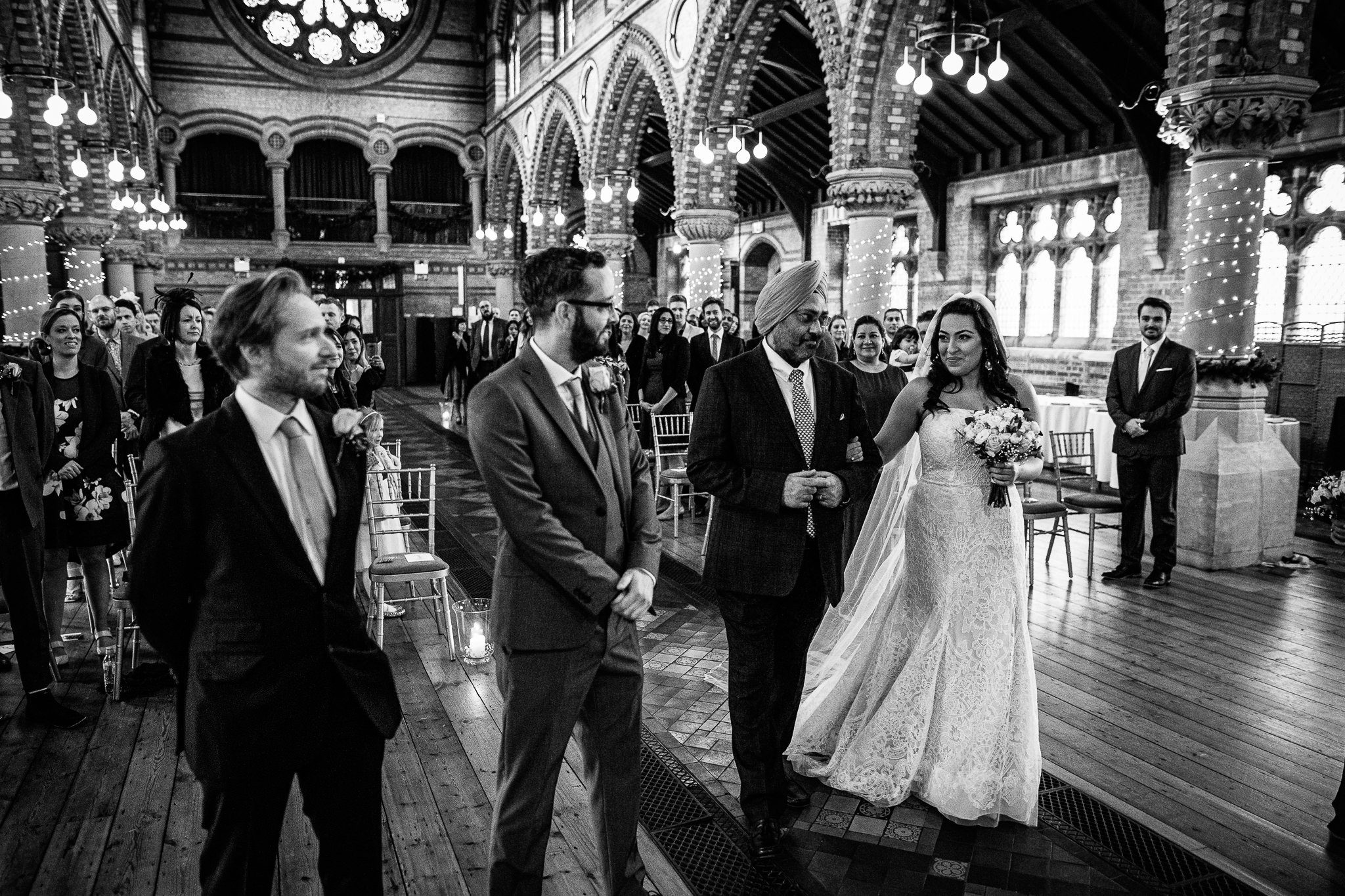  Father of the Bride giving away his daughter on her wedding day at St Stephen’s Trust Hampstead 