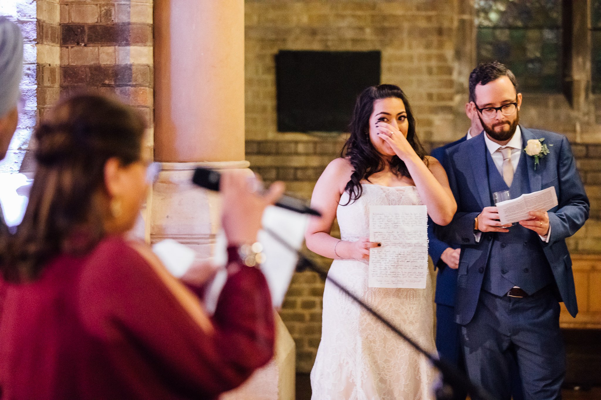  Bride wiping away a tear during the speeches 