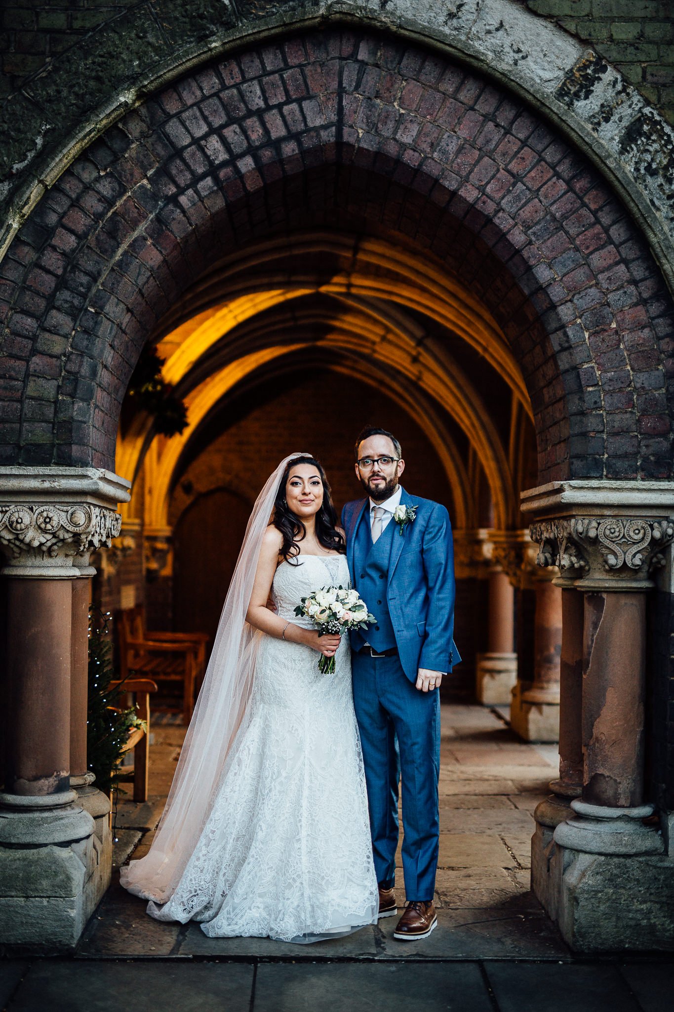  Bride and Groom under an archway at St Stephen’s Trust Hampstead London 