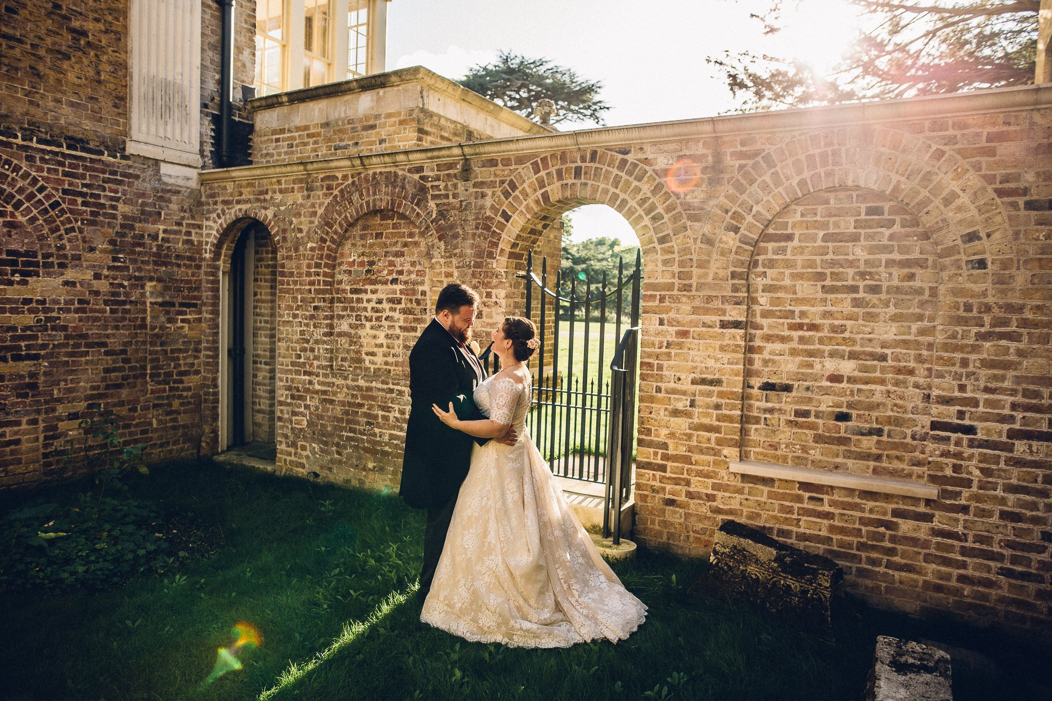  Bride and Groom in the late afternoon sun in the grounds of  Pitzhanger Manor 