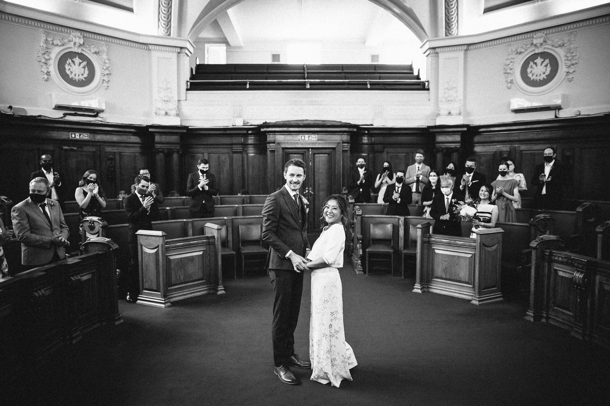  Bride and Groom during the ceremony at  Islington Town Hall 