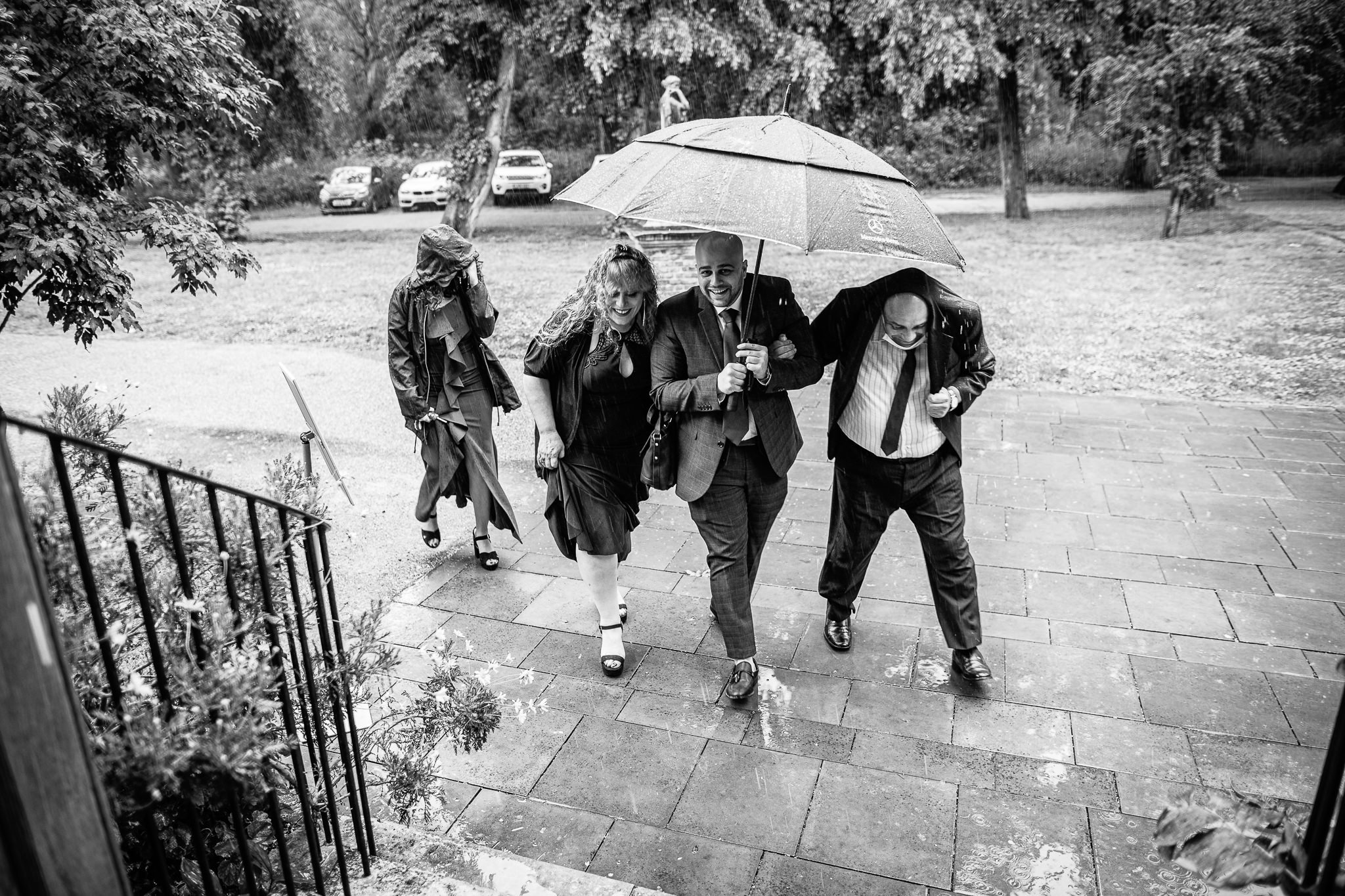  Guests arrive in the rain at  Orleans House Gallery 