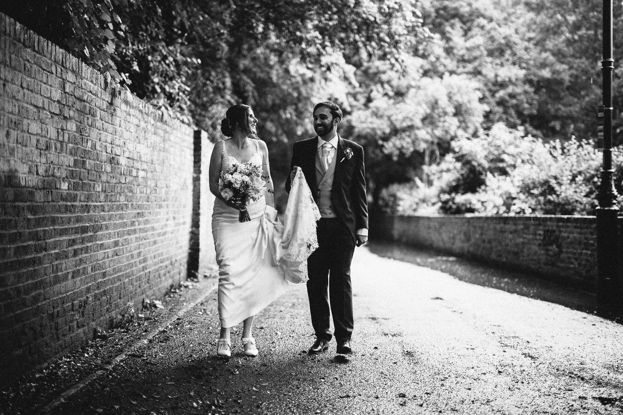  Bride and Groom walking around the grounds of  Orleans House Gallery 