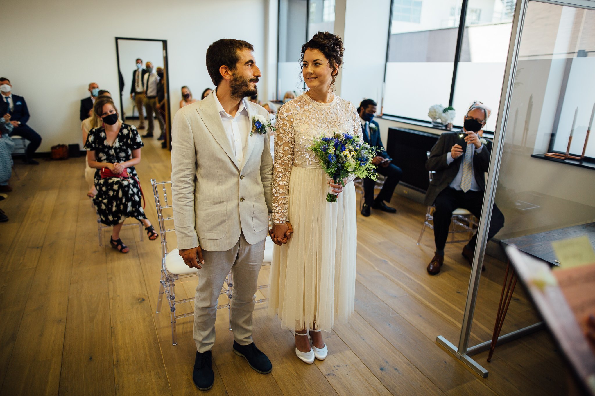  Bride and Groom during the ceremony at Hammersmith Register Office. 
