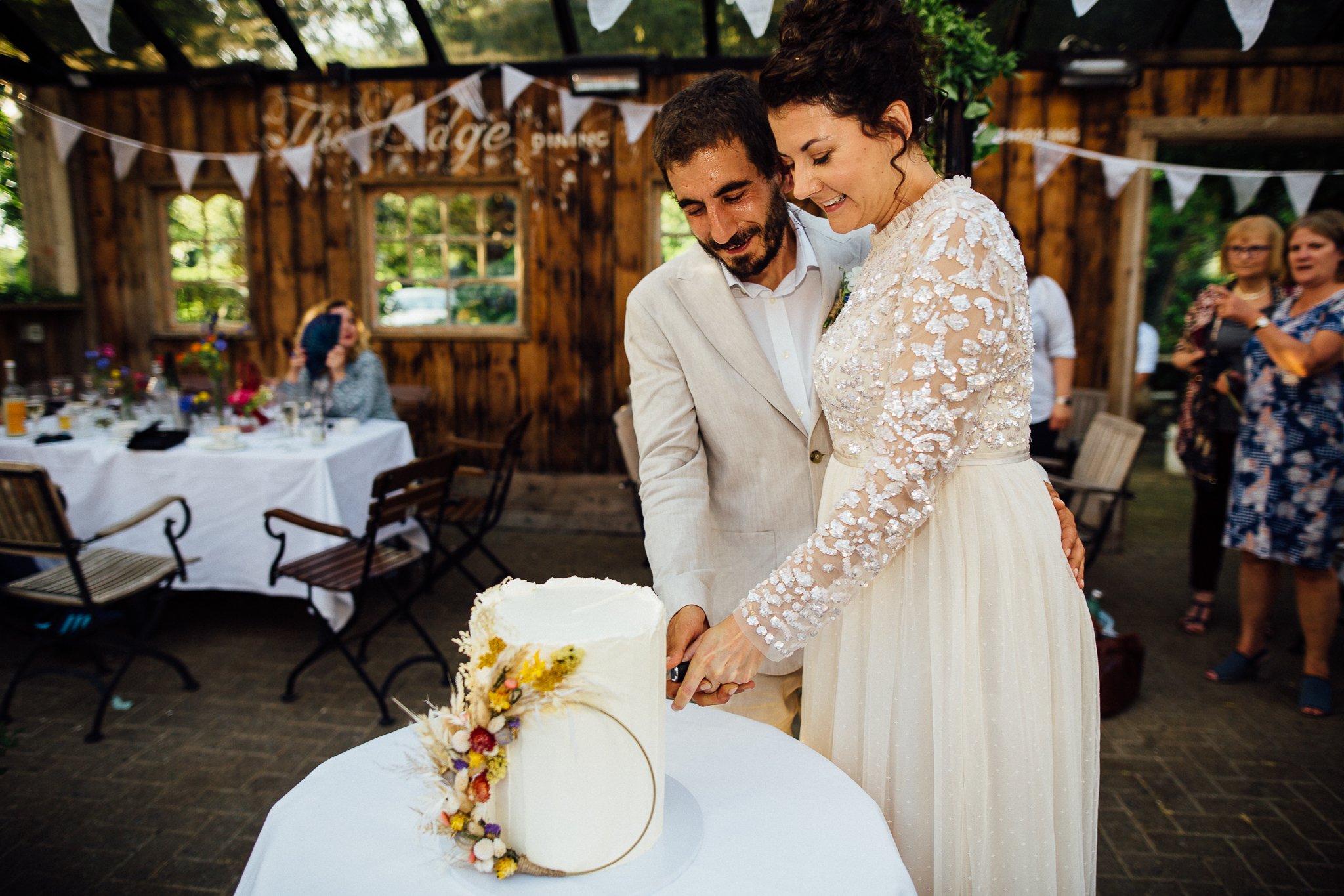  Bride and Groom cutting the cake 