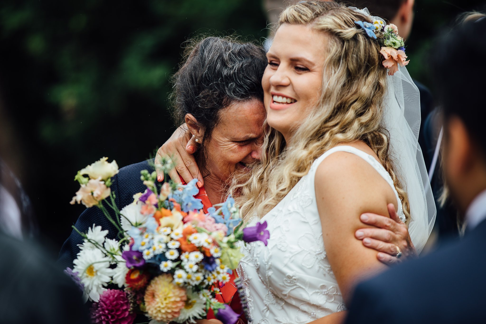  Mother of the Bride hugs her daughter 