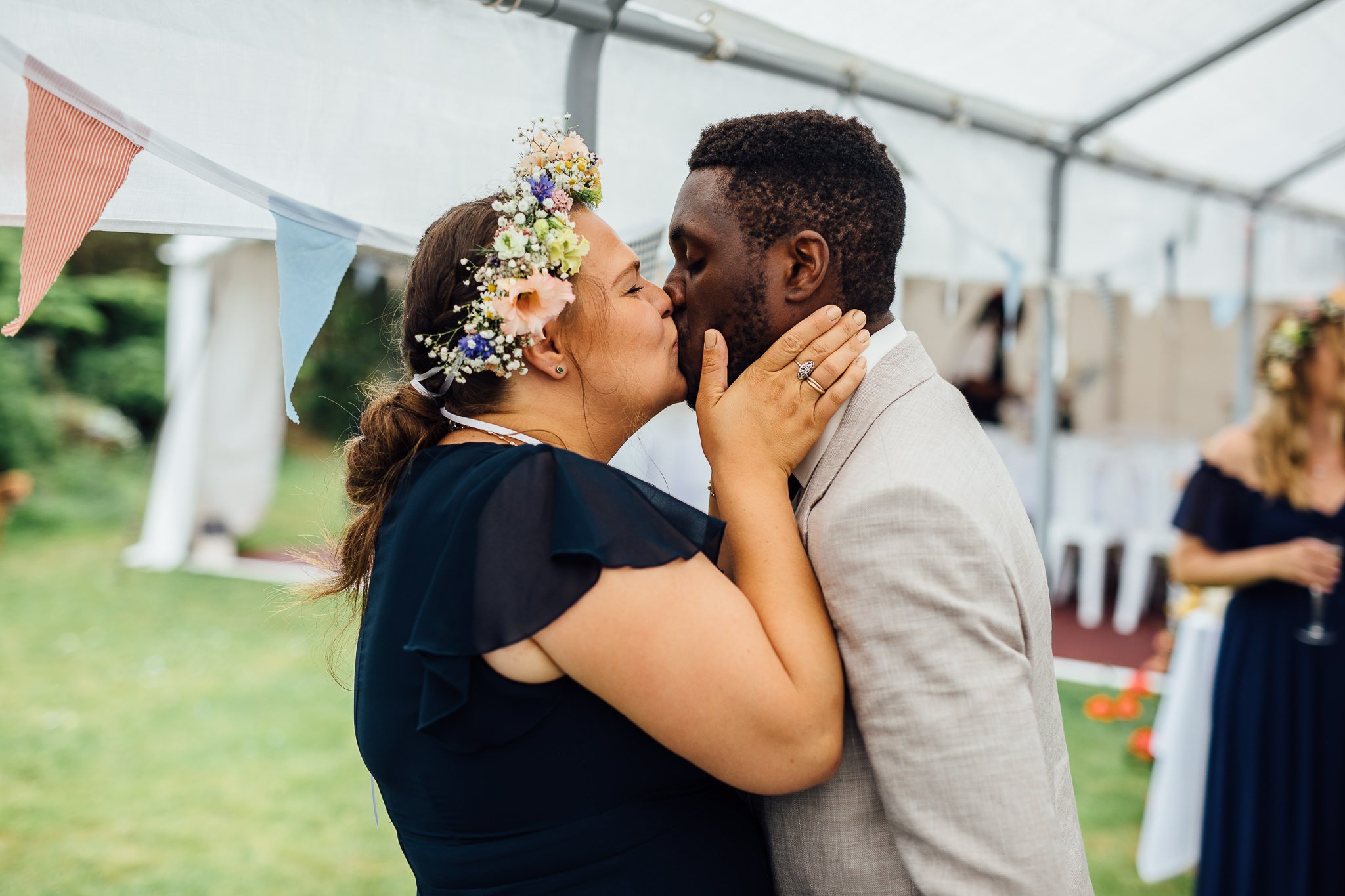  Wedding guests kissing 