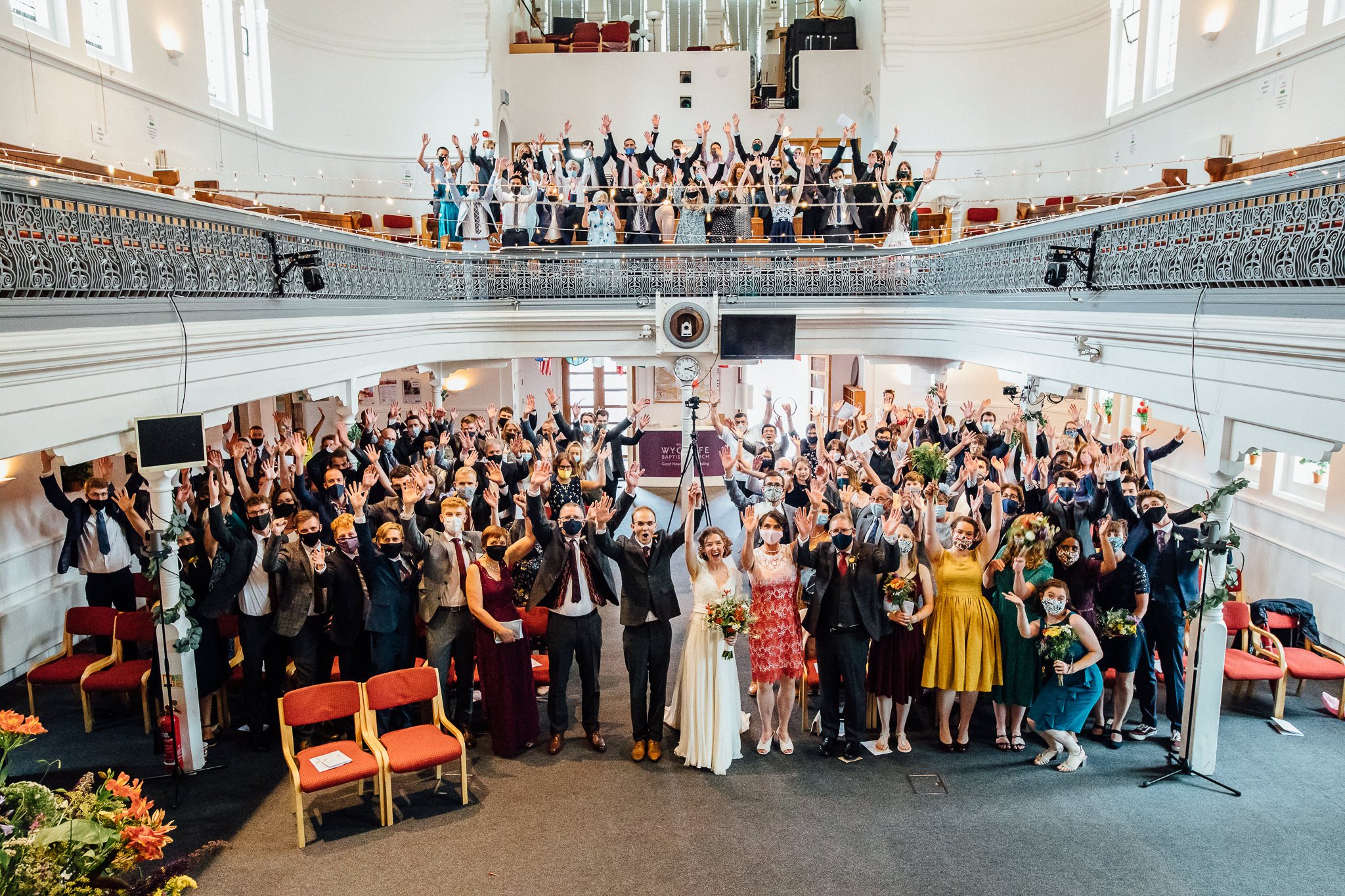  Group photo of all the wedding guests at Wycliffe Baptist Church in Reading 