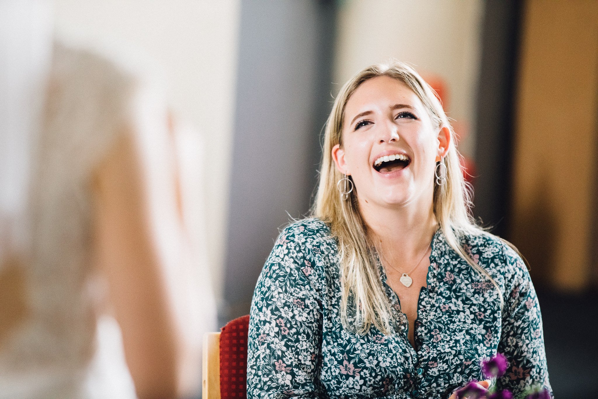  Wedding guest laughing at Wycliffe Baptist Church in Reading 