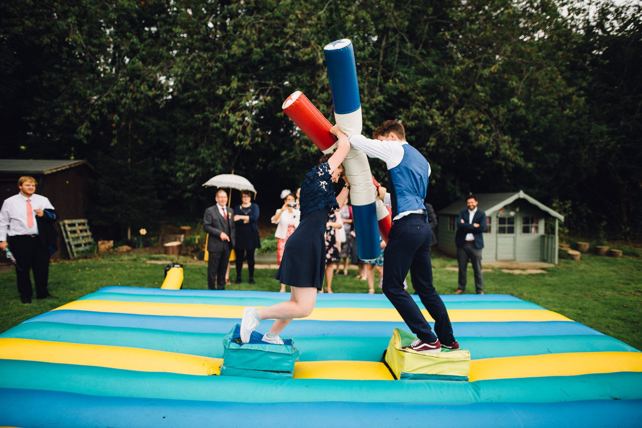  Wedding guests play a game at Harpsden Village Hall 