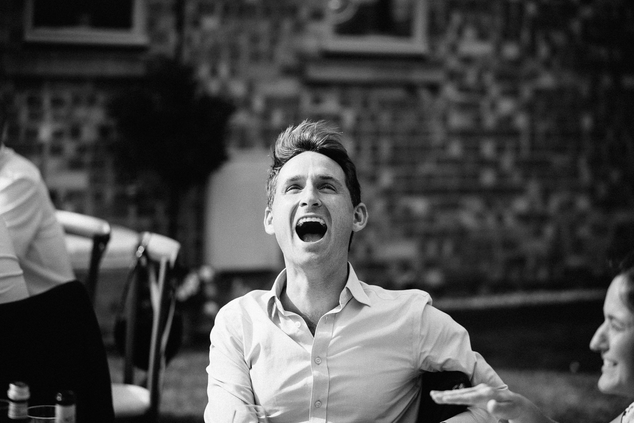  Wedding guest laughing 