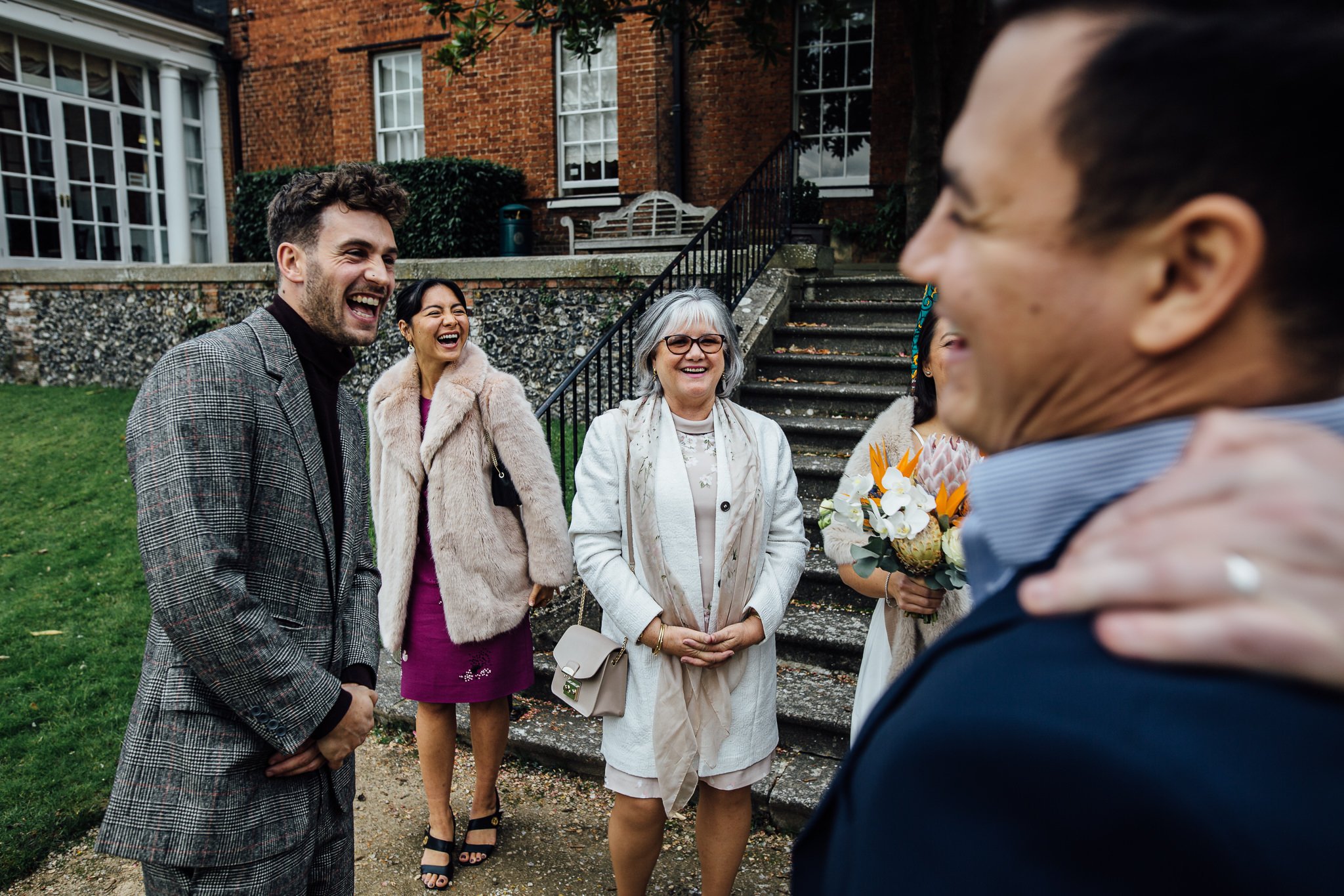  Wedding guests smiling 