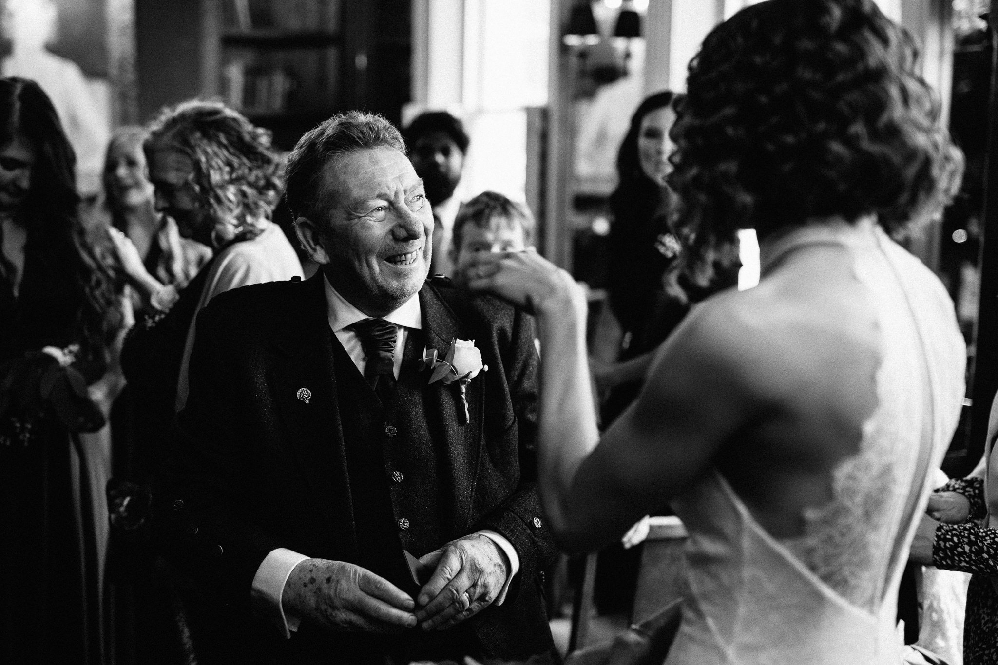  Wedding guest talking to the Bride 