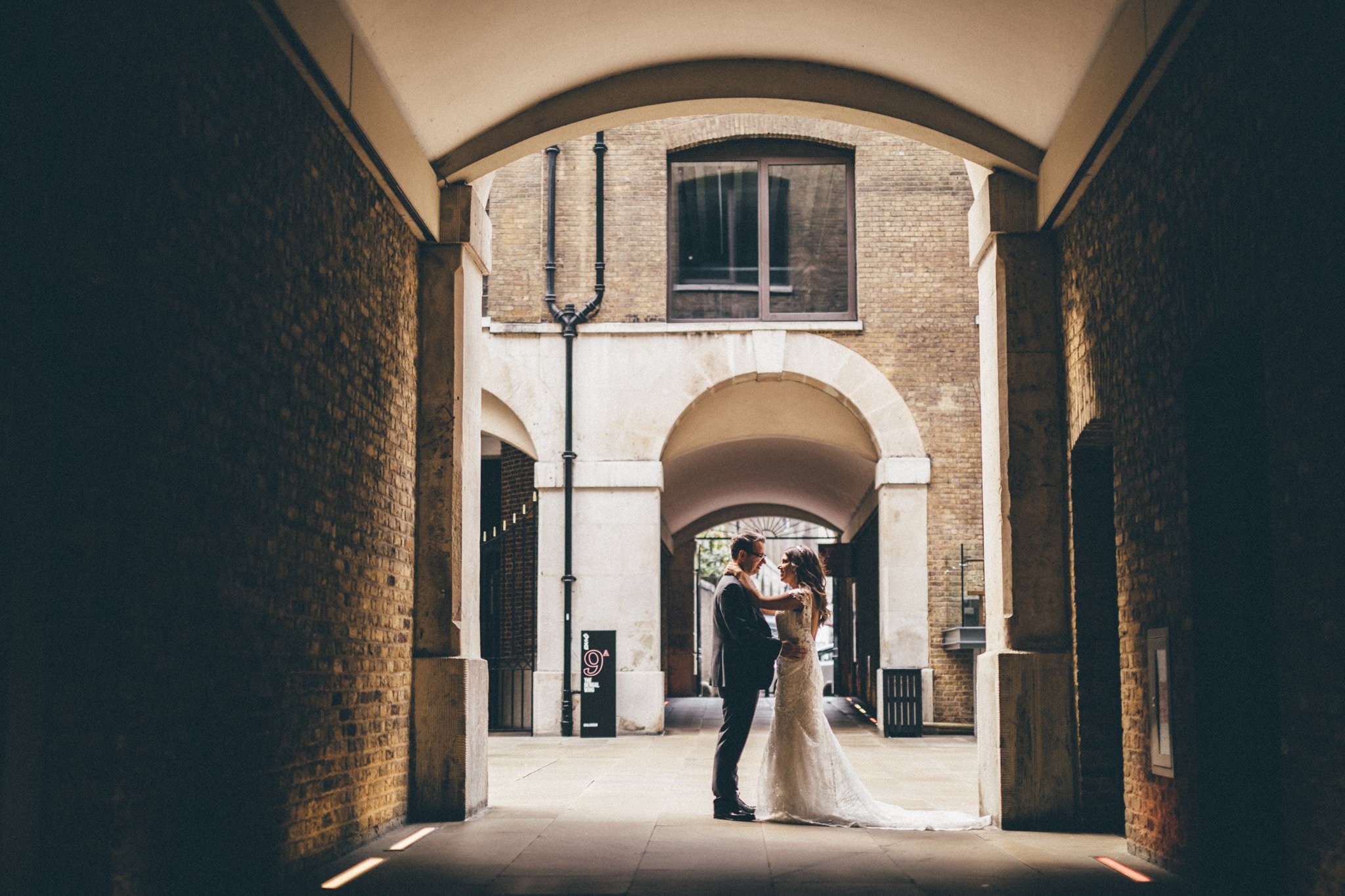  Bride and Groom embrace each other at Devonshire Terrace 