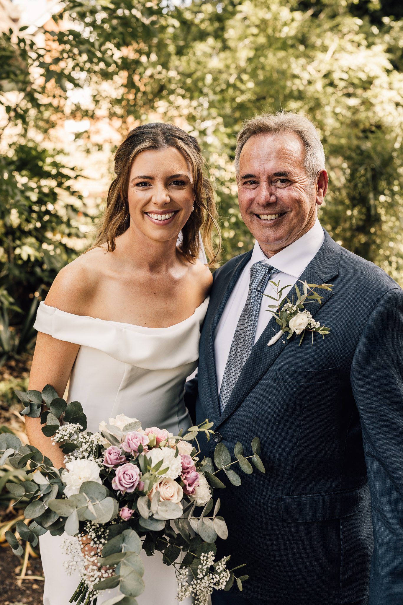  Bride and her rather outside All Saints Church in Hampton 