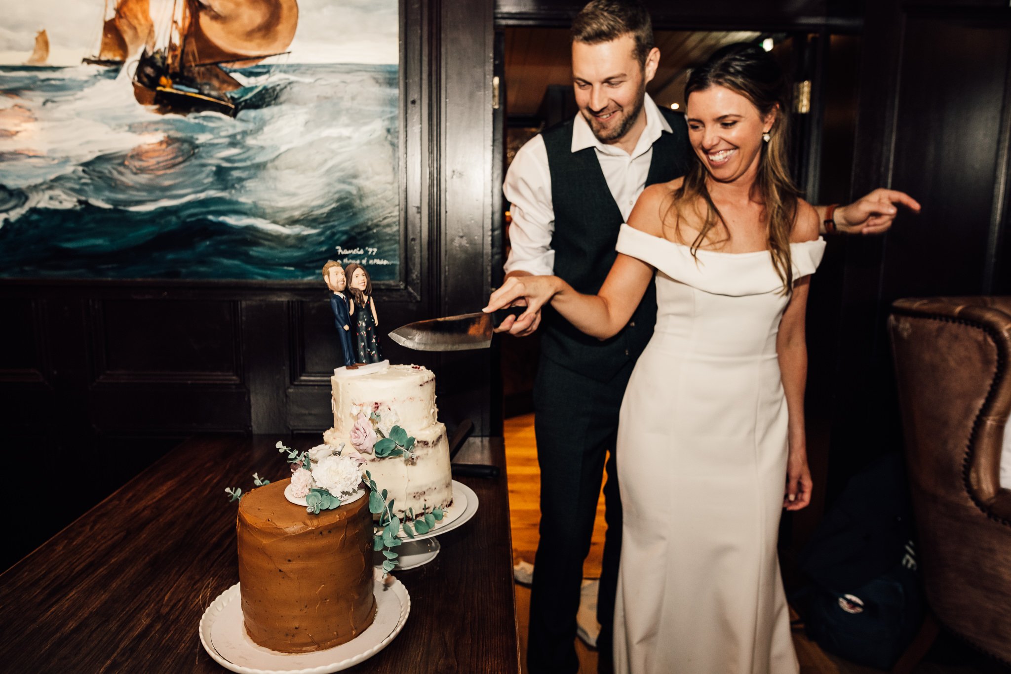  Bride and Groom cut the wedding cake at The Old Ship Hammersmith 