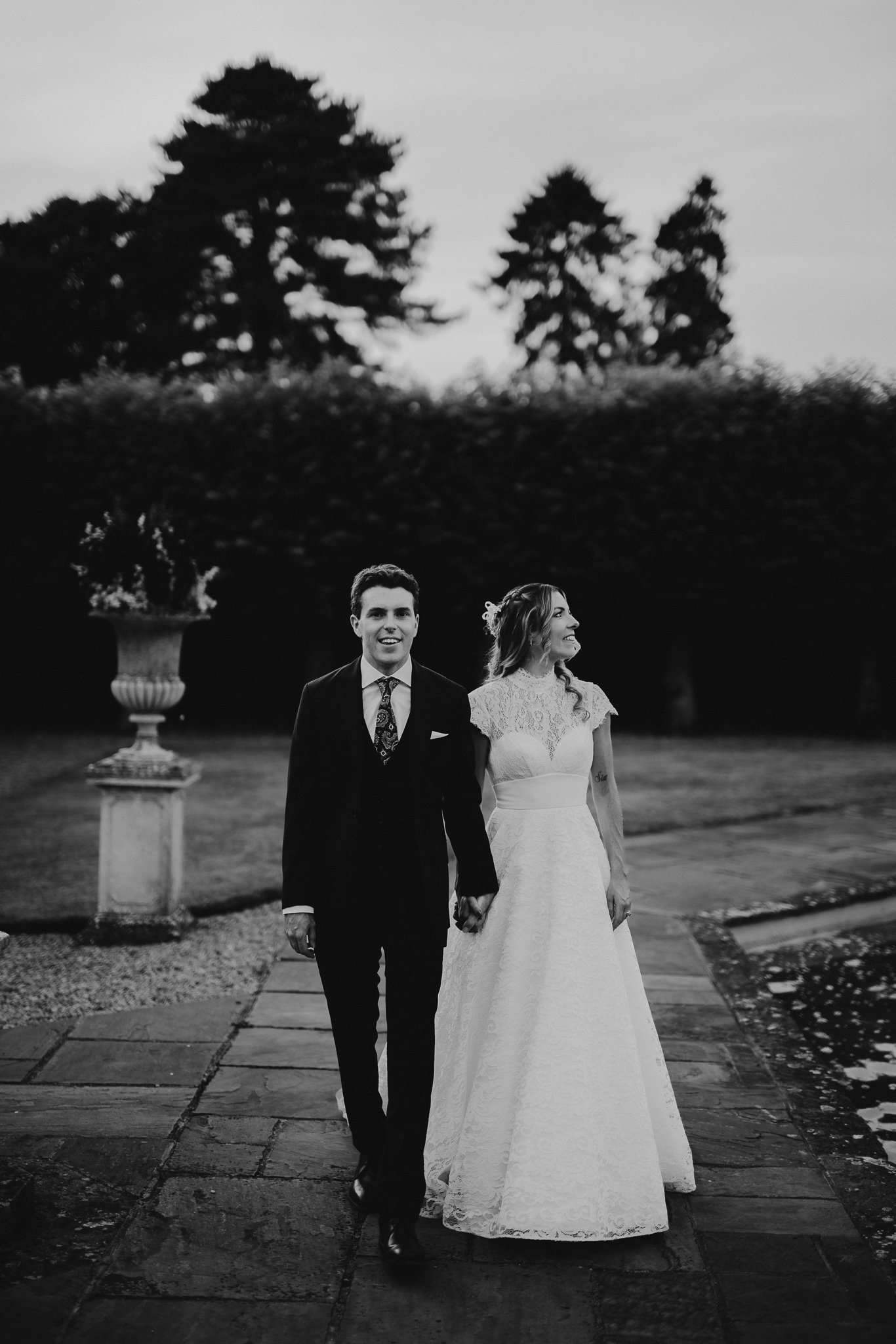  Bride and Groom walking together at Arley House and Gardens 