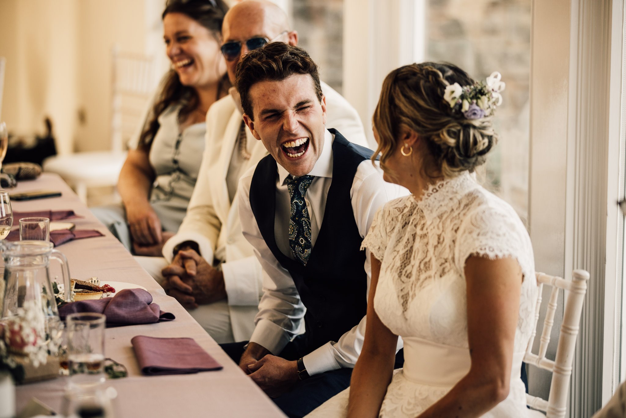  Groom laughing during the speeches at Arley House and Gardens 