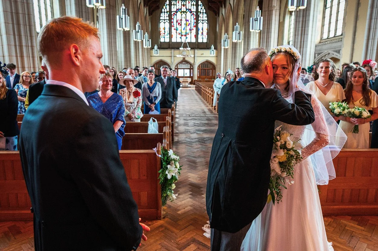 Father giving the bride away