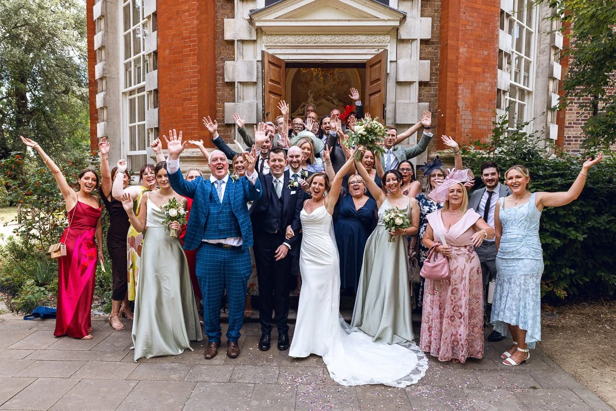 The entire wedding group in a group photo
