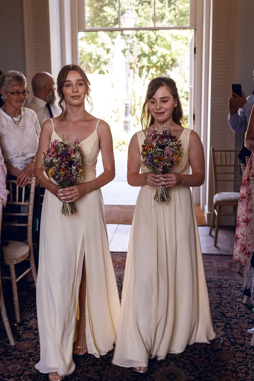 Bridesmaids walking down the aisle