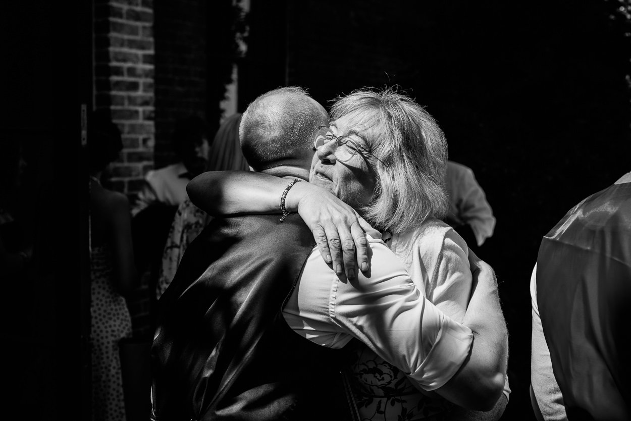 Emotional hug between guests
