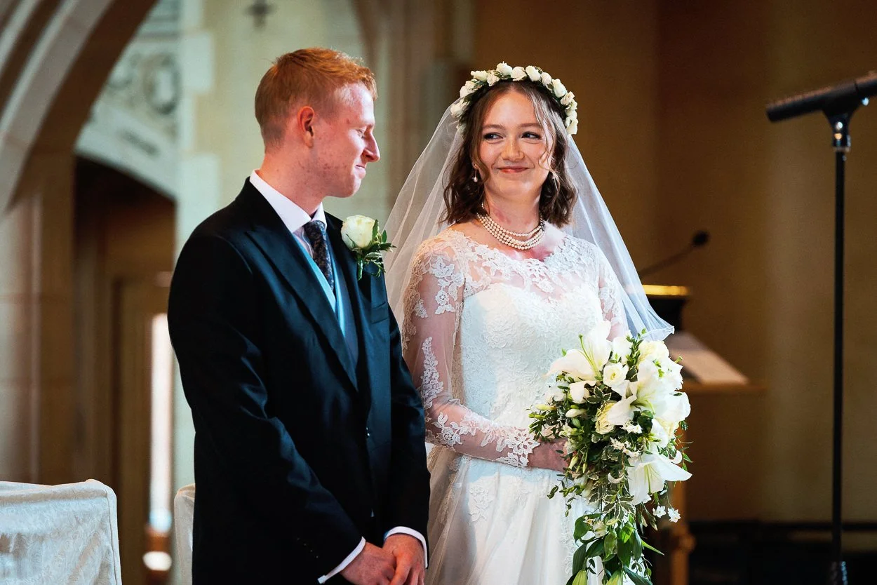 The bride and groom at the altar