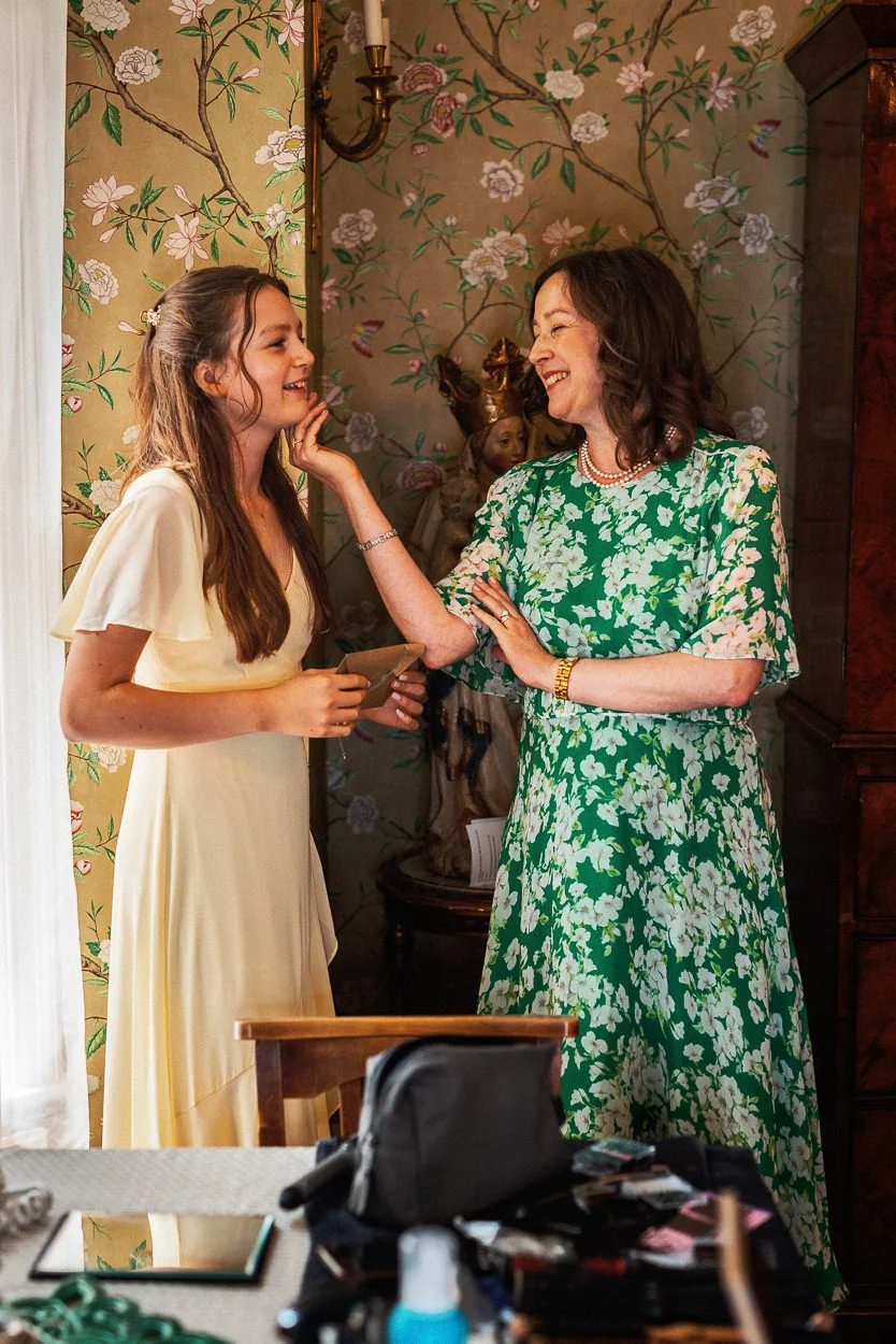 A joyful moment during prep between mum and daughter