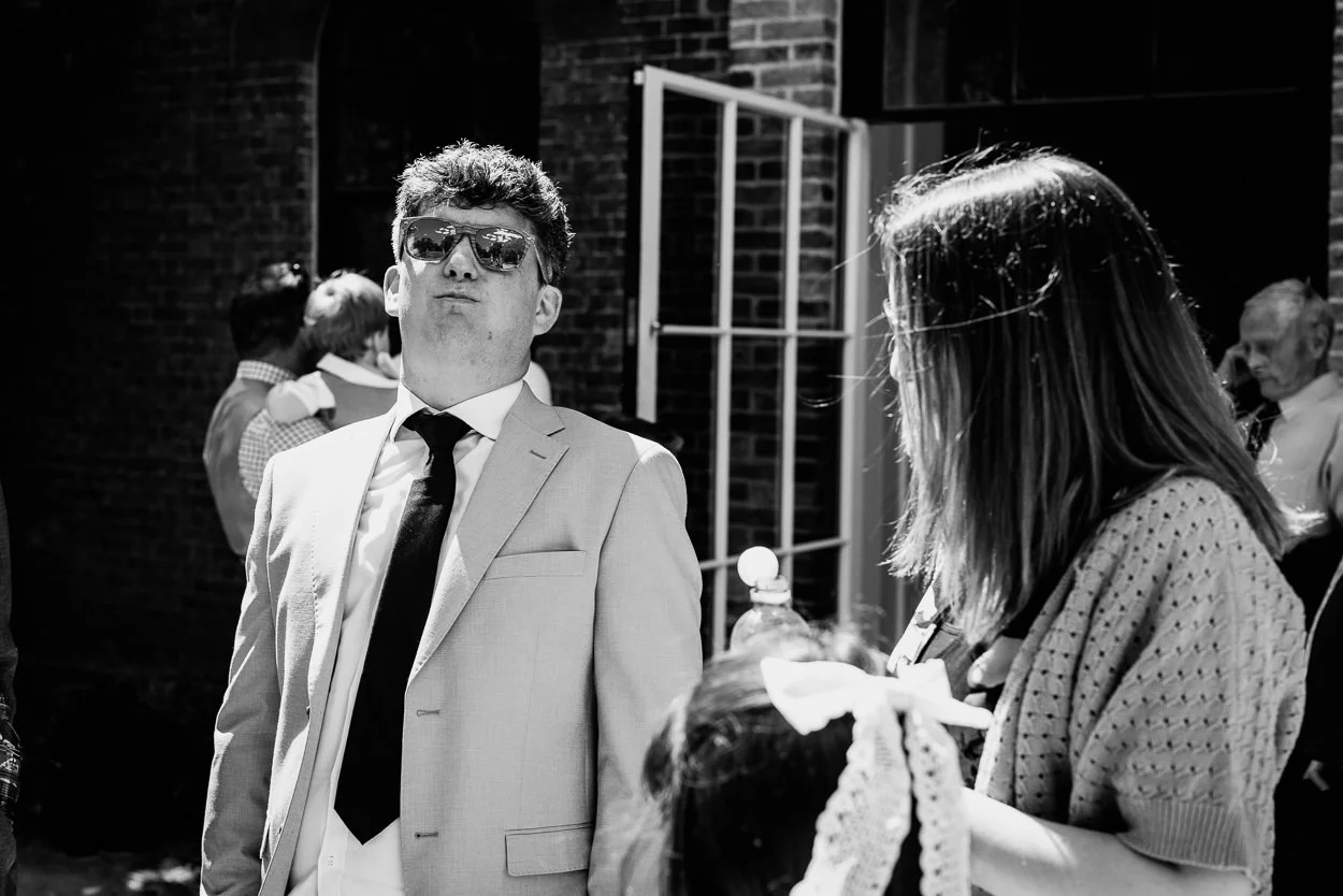 Groom wearing sunglasses