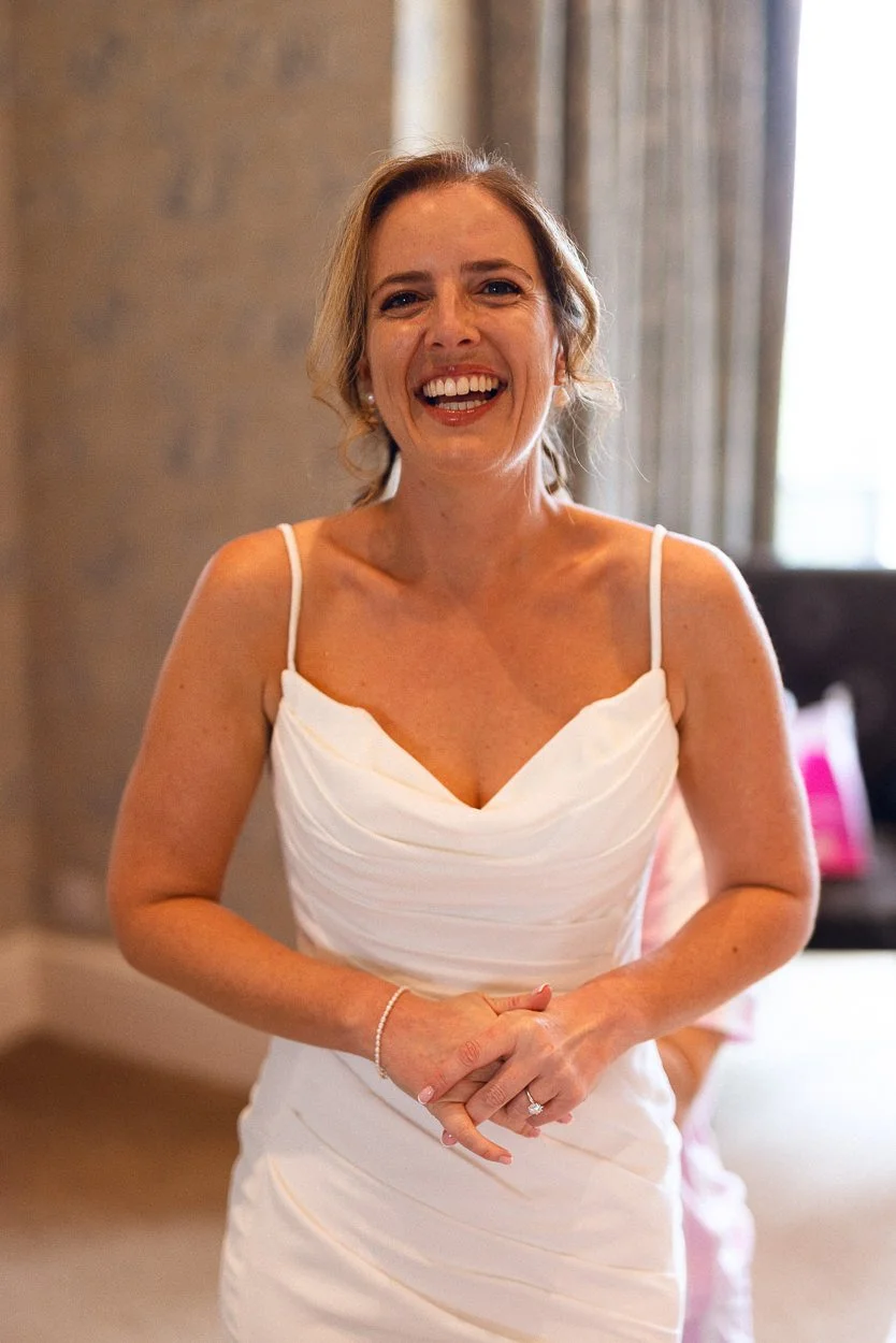 The bride smiling