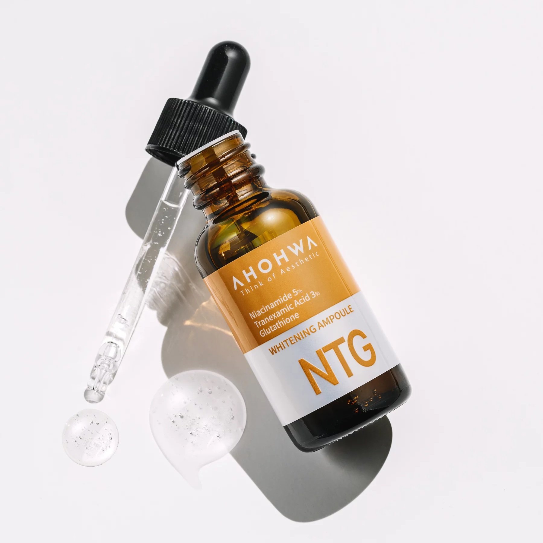 NTG Whitening Ampoule on a white backdrop with a product swatch that shows a jelly-like consistency