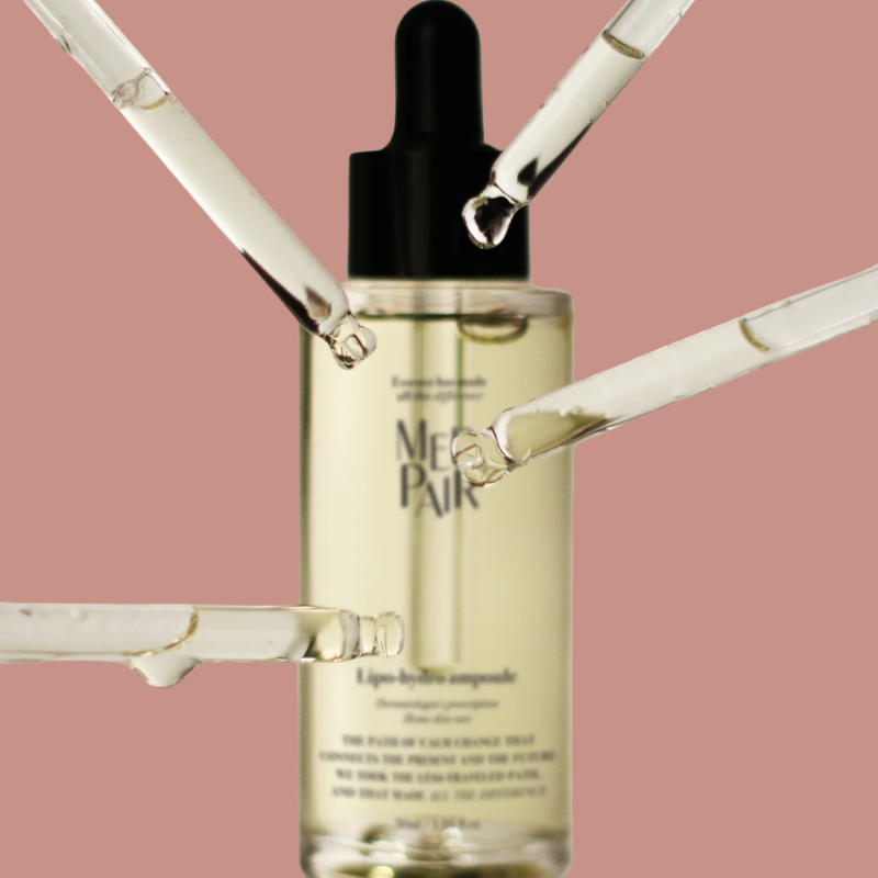 Medipair Lipo-Hydro Ampoule skincare bottle with liquid hydrating serum dispensing from a glass dropper