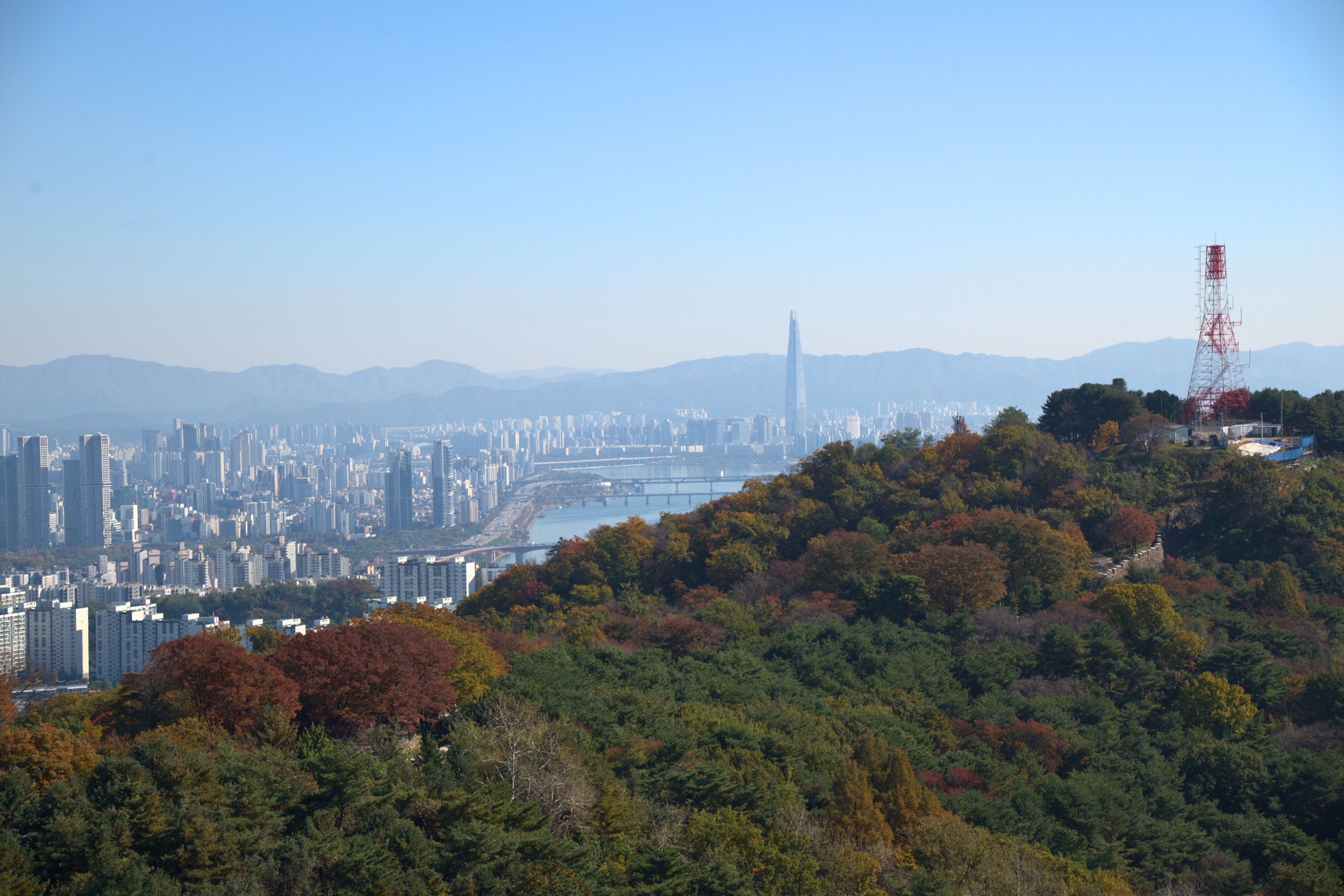 Seoul South Korea cityscape with modern skyscrapers and traditional hanok rooftops
