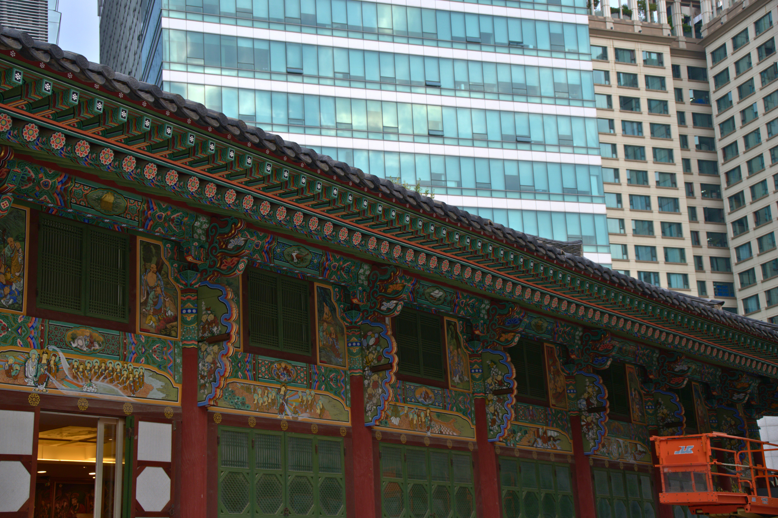 old temple next to new building in Seoul, South Korea
