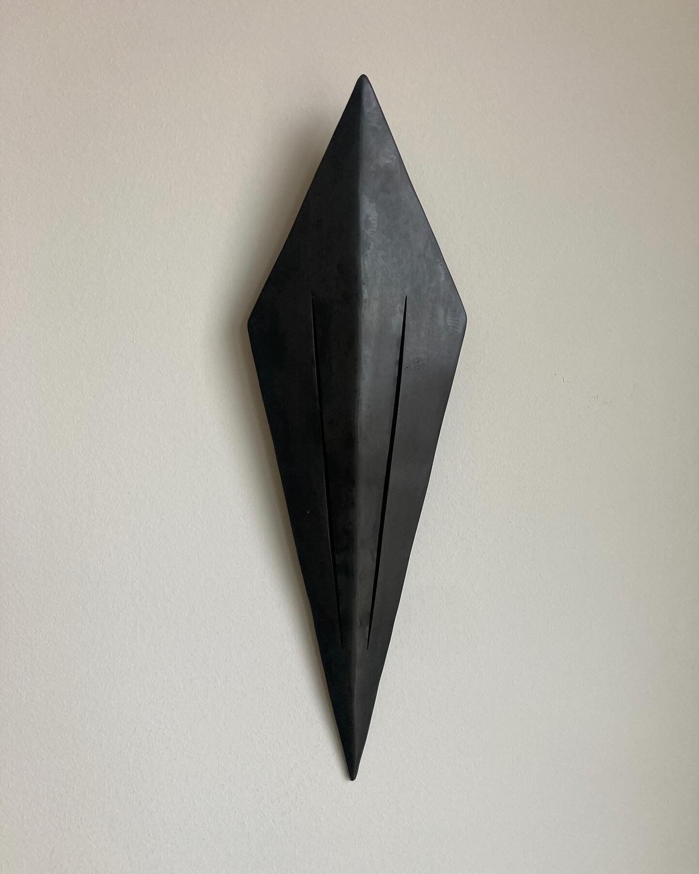 This is an untitled piece from 2011 (?) that hangs on the wall in my apartment. I used to make lots hollow forms from welded sheet metal and I&rsquo;ve been thinking about it a lot lately. This wall mounted piece measures about 16&rdquo; tall. I made