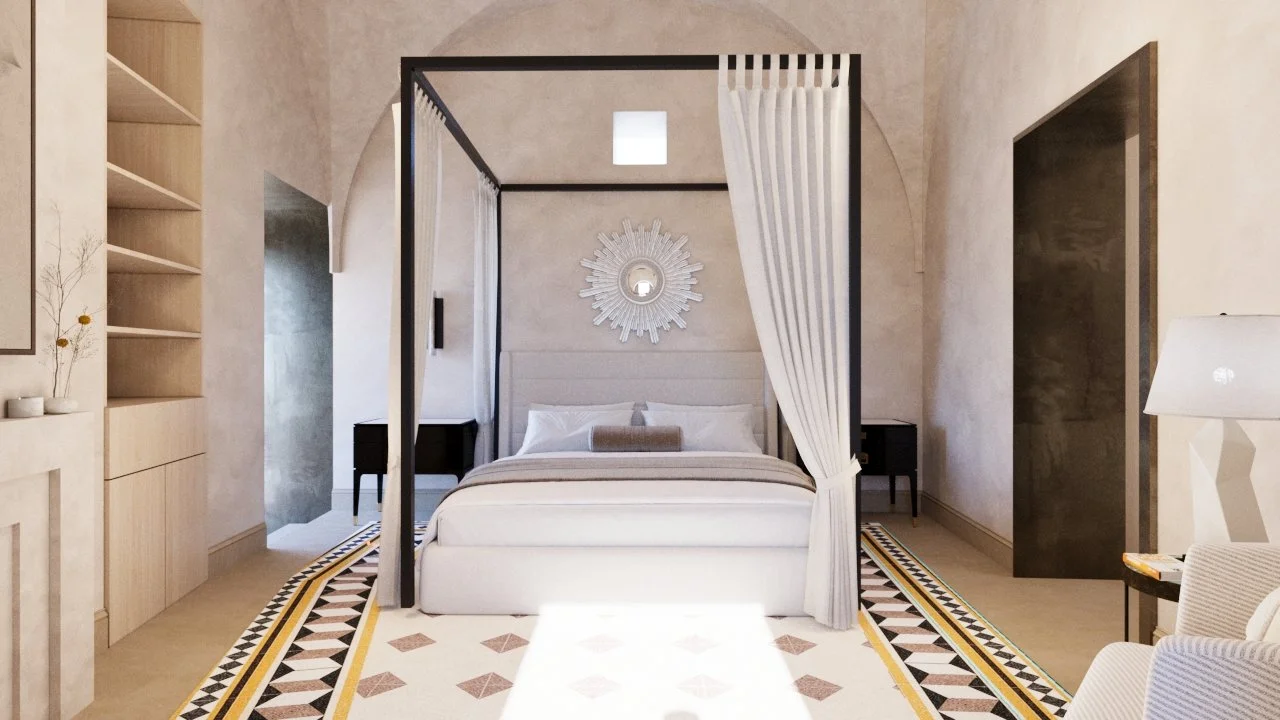 A bright, elegant bedroom with a four-poster bed, white curtains, and modern decor, including a mirror on the wall, nightstands, and a patterned rug.