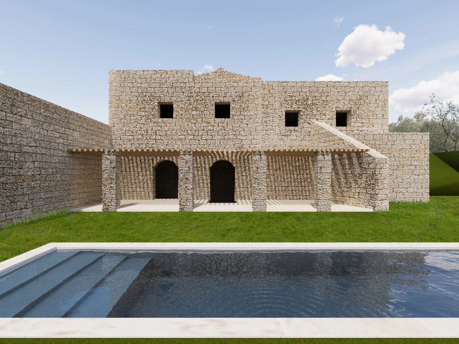 A stone building with arched doorways, small windows, a wooden pergola, a grassy yard, and a swimming pool in the foreground under a partly cloudy sky.