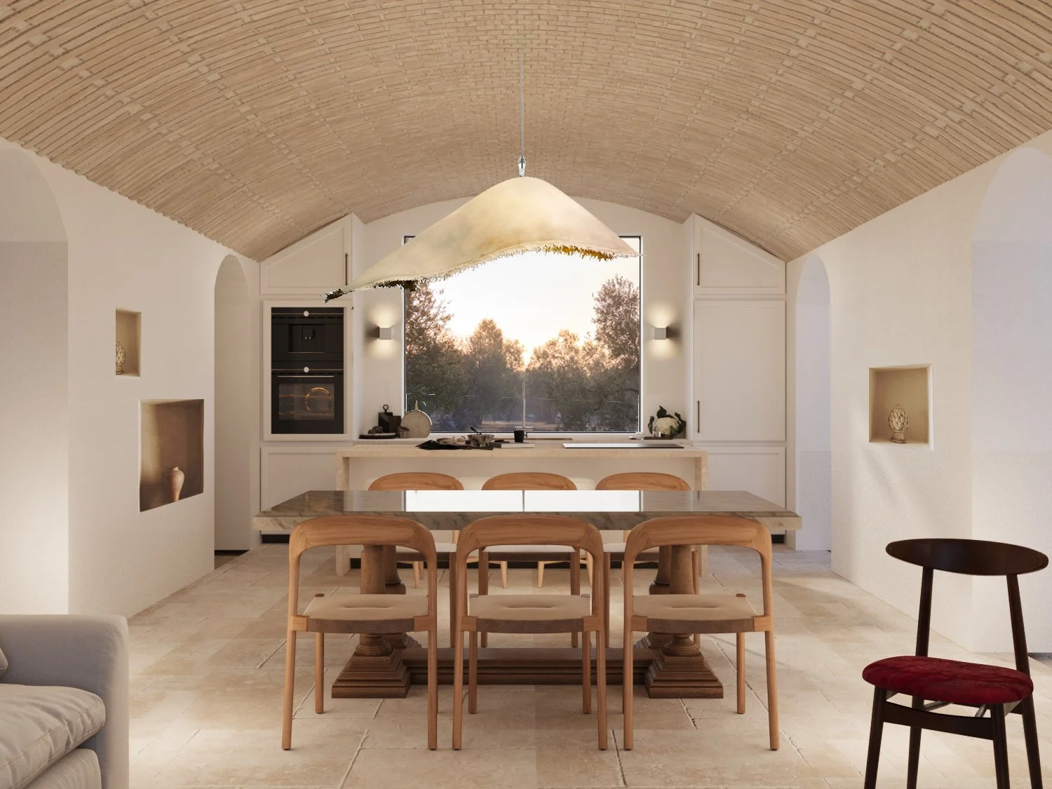Modern dining area with a large wooden table, six chairs, a unique hanging light fixture, and a window with a view of trees at sunset.