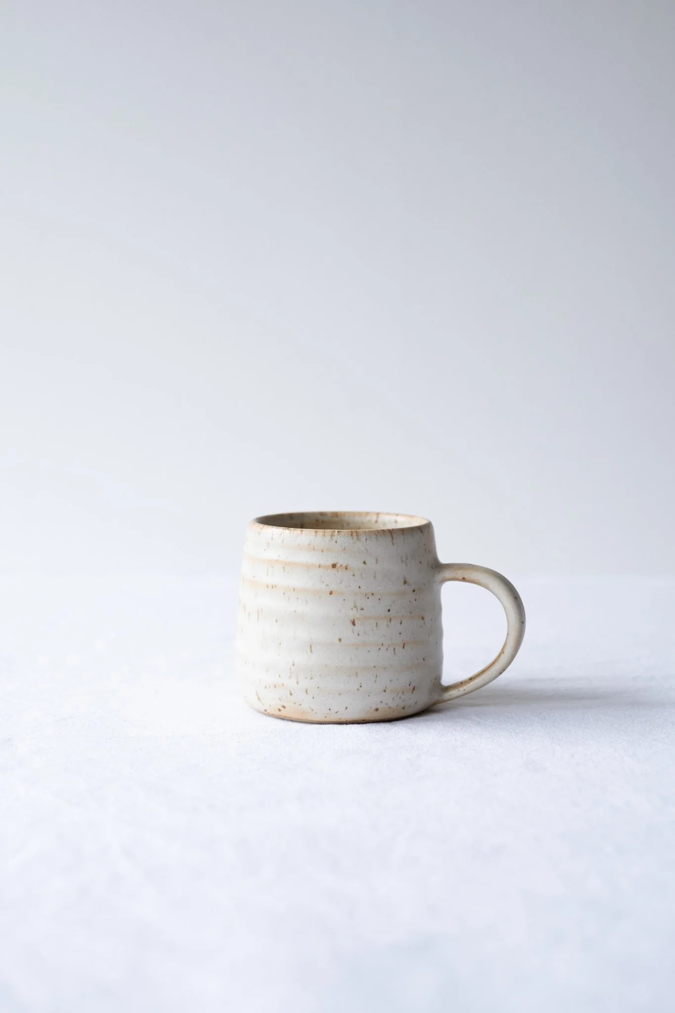 Coffee mug in speckled alabaster