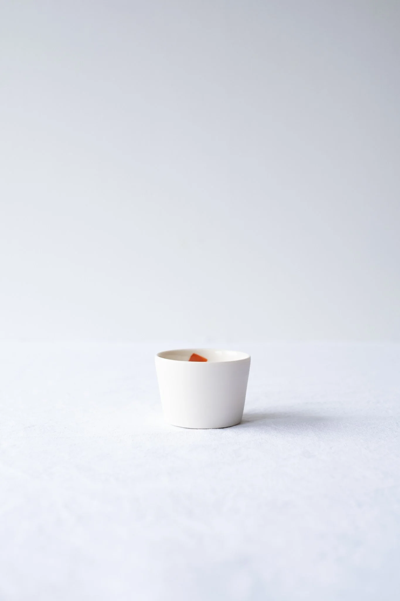 Small porcelain cup hand-painted No. 2