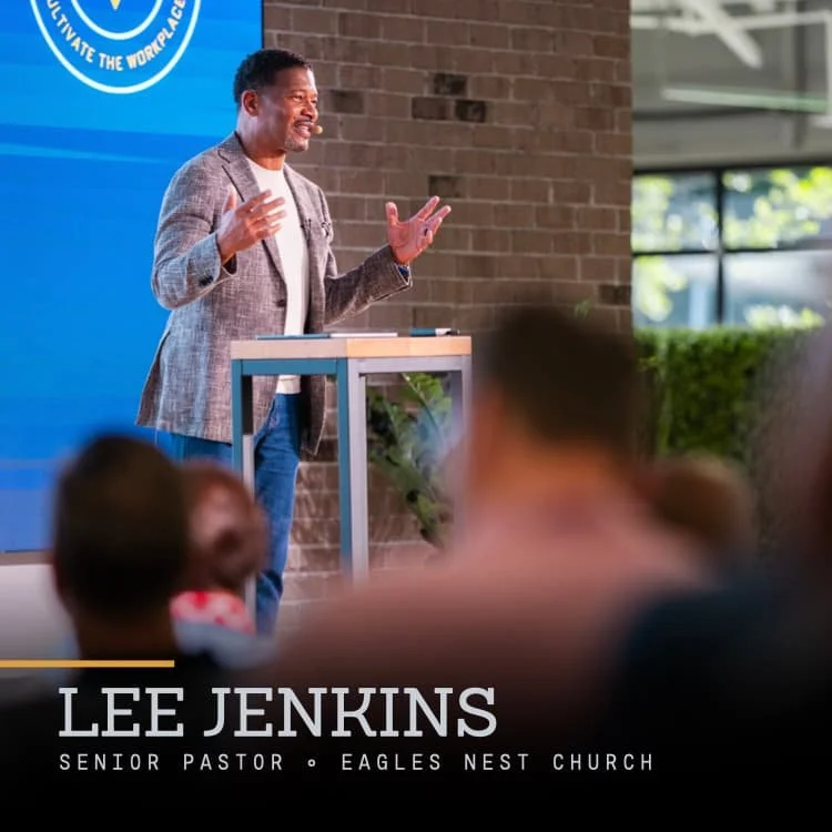 Lee Jenkins, senior pastor at Eagles Nest Church, speaking at a podium during a presentation or sermon in a church or conference setting.
